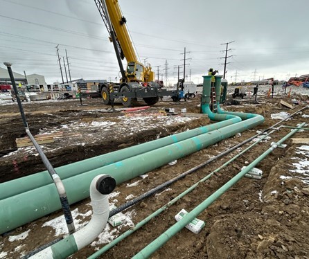 Crews continue to focus on installing underground utilities throughout the project site