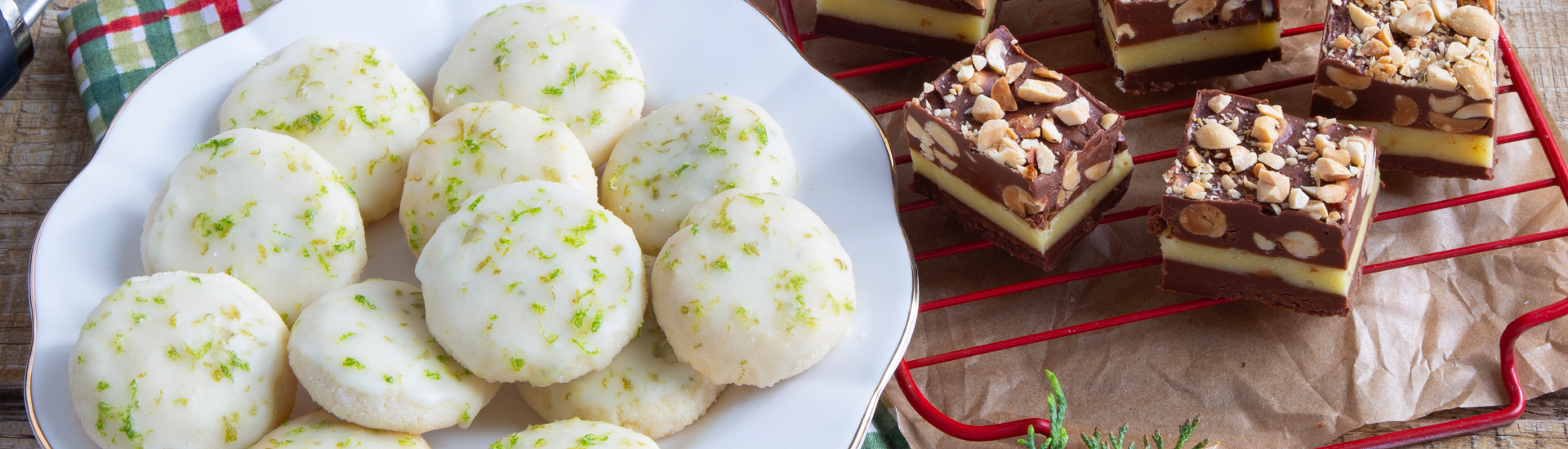 white cookies with lime zest and chocolate bars with nuts