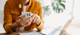 person reviewing their bill using phone