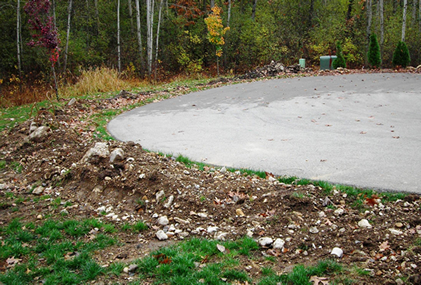 Basic repair showing backfill of trench around cul de sac with 6- to 8-inch mounding to allow for settling